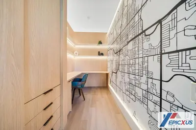 a hallway with a drawing on the wall at The Epic 3 Lake View Vista Cay Resort Orlando Florida in Orlando
