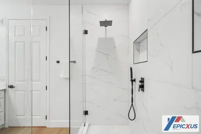 a shower with a glass door in a bathroom at The Epic 3 Lake View Vista Cay Resort Orlando Florida in Orlando