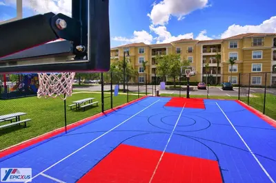 a basketball court with a hoop in a park at The Epic 3 Lake View Vista Cay Resort Orlando Florida in Orlando