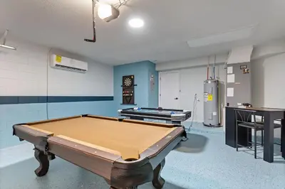 a room with a pool table in it at Magical Hideaway at Kissimmee by Shine Villas villa in Kissimmee