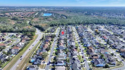 an aerial view of a city with houses at Magical Hideaway at Kissimmee by Shine Villas villa in Kissimmee