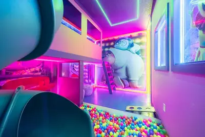 a room with a pink refrigerator with a stuffed animal at 2026 NEW Home 8 Bedrooms At Bella Vida in Kissimmee