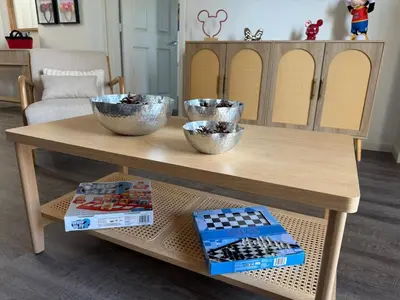 a coffee table with two bowls on top of it at Magical Condo 3 bedroom in Orlando