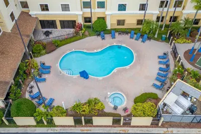 an overhead view of a swimming pool in a resort at Well-Located 1BR Kitchen Near Theme Parks in Orlando