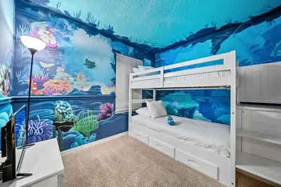 a bedroom with an underwater theme with a bunk bed at Cozy Villa 08 BedroomsPoolGame Room in Kissimmee