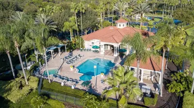 an aerial view of a house with a swimming pool at Magari at Emerald Island in Kissimmee