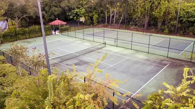an overhead view of a tennis court at The Beauty at Emerald Island in Kissimmee