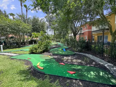 a group of miniature golf courses at a resort at Meriggiare at Emerald Island in Kissimmee