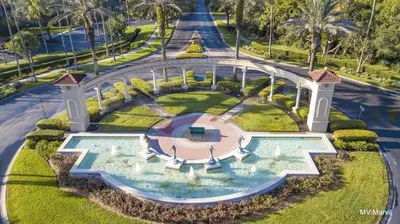 an aerial view of a house with a swimming pool at Asteria at Emerald Island in Kissimmee