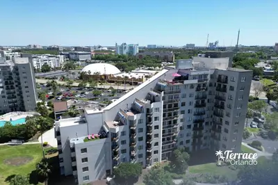 an aerial view of a city with tall buildings at Relaxing 2 Bed 2 Bath Condo with Garden View Balcony 7 Min to Universal in Orlando