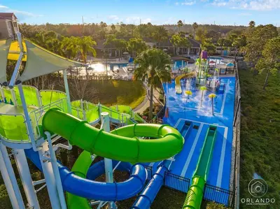 an image of a water park with a water slide at Free Arcade! All Themed! South Facing Pool & Spa! in Orlando