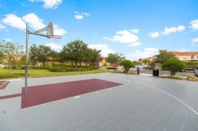 a basketball court with a basketball hoop at Dream 8-Bedroom Home with Pool in Kissimmee