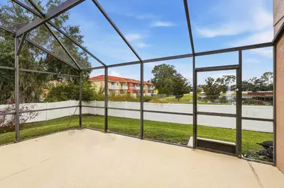 a view of a basketball court from the inside of a building at The Seasons Retreat 5BR Oasis with Private Pool in Kissimmee