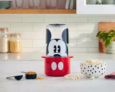 a hello kitty blender in a red container on a kitchen counter at Stylish 4BR Townhome Private Pool BBQ & Near Disney in Kissimmee