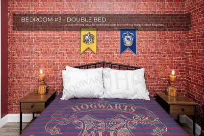 a bedroom with a brick wall with a bed with two tables at 5BRDisney Villa Pool,Game Room & Resort Access in Kissimmee