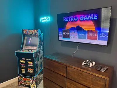 a nintendo wii game room with a nintendo wii video game machine at Kingdoms and Galaxies Luxury Villa in Kissimmee