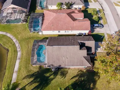 an overhead view of a house with a roof at Holiday Home Moderne Villa mit Seeblick nur wenige Minuten von Disney entfernt by Interhome in Kissimmee