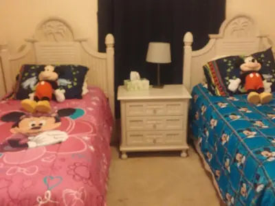 a bedroom with two beds with stuffed animals on them at Apartment Wasserpark Fantastischer Pool Nur wenige Minuten von Disney Parks entfernt by Interhome in Orlando