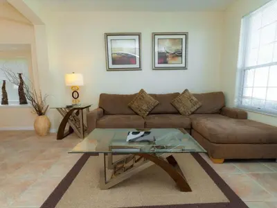 a living room with a couch and a glass table at Holiday Home Villa Glenbrook Resort by Interhome in Orlando