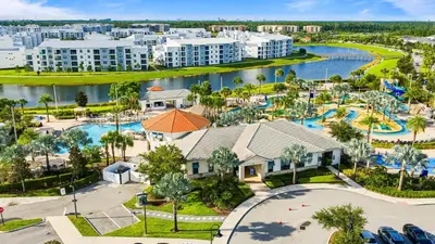 an aerial view of a resort with a pool at Mario & Fairy 3BR Condo w Free Water Park 303 in Kissimmee