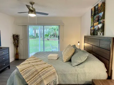 a bedroom with a bed and a ceiling fan at Superior 3BR Condo Apartment Near Disney Attractions in Kissimmee