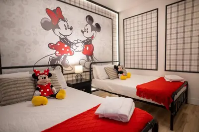 a bedroom with two beds with stuffed animals on them at Family 3BR Home in Lucaya Resort in Kissimmee