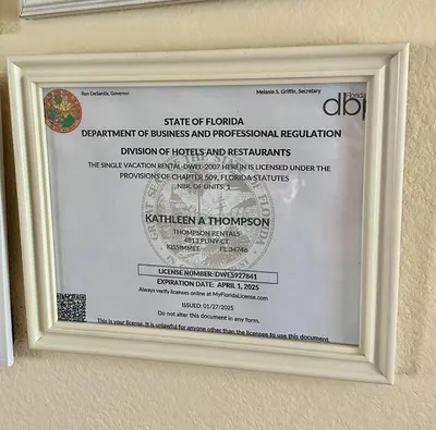 a framed picture of a certificate of honor on a wall at 4813 Pliny Court in Kissimmee
