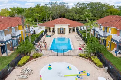 an aerial view of a pool at a resort at Peaceful Palms Stay for 6 in Kissimmee