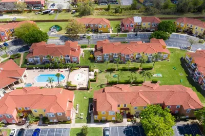 arial view of a home with a lot of houses at Peaceful Palms Stay for 6 in Kissimmee