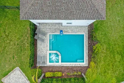 an overhead view of a swimming pool in a yard at 160 Minton Loop in Orlando