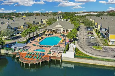 an aerial view of a resort with a pool at 4 Bedroom 3 Bathroom Villas At Seven Dwarfs 24-101 in Kissimmee