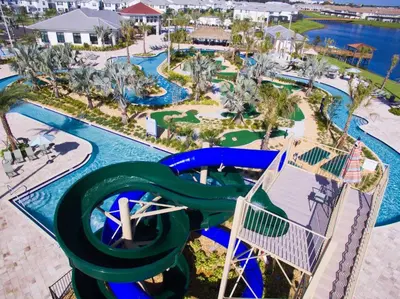 an aerial view of a water slide at a resort at Cozy Home Luxury 04 Bedrooms At Storey Lake in Kissimmee