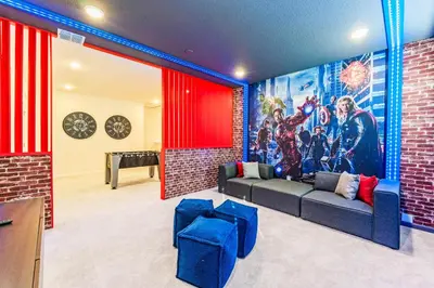 a living room with a couch and a brick wall at Ev2440 - Orlando Luxe Retreat in Kissimmee