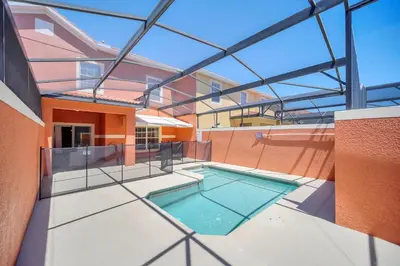 a swimming pool in the middle of a building at Ev8940 - Magic Palms Retreat in Kissimmee
