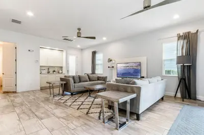 a living room with a couch and a table at Ev1472 - Reunion Getaway in Orlando