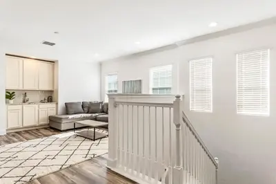 a living room with a couch and a table at Ev1472 - Reunion Getaway in Orlando