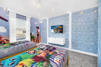 a bedroom with two beds and a large window at Ev2444 - Palm Breeze Escape in Kissimmee