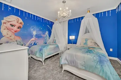 a bedroom with two beds with a mermaid mural at Ev2826 - Magical Horizon Villa in Kissimmee