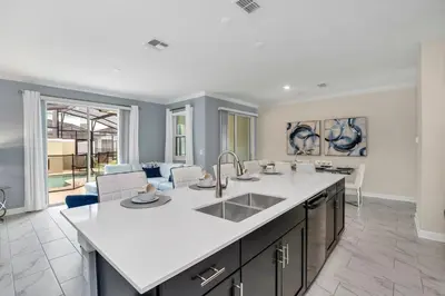 a kitchen with a sink and a counter top at Ev2861 - Sunshine Grove Villa in Kissimmee