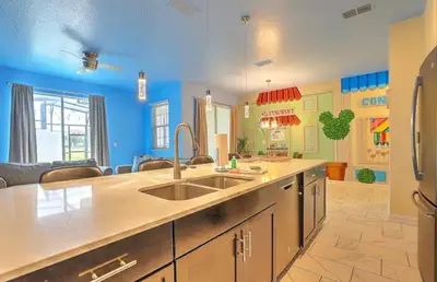 a kitchen with a sink and a counter top at Ev4835 - Adventure Cove Villa in Kissimmee