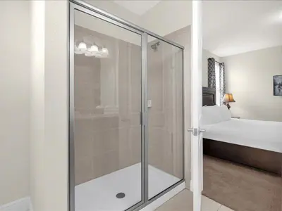 a bathroom with a shower with a glass door at Ev7501 - Encore in Orlando