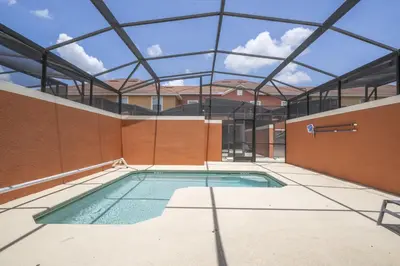 a swimming pool in the middle of a building at Ev89270 - Paradise Manor in Kissimmee