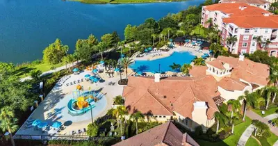 an aerial view of a resort with a swimming pool at Vista Cay Resort Near Parks Convention Center in Orlando