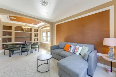 a living room with a couch and a table at Fish and Boat Lake Toho Family Gem Near Theme Parks in Kissimmee