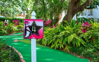 a sign with a cat on a green path at Star Island Resort and Club - Near Disney in Kissimmee