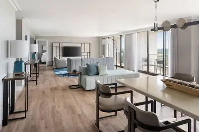 a living room with a couch and a table at Orlando World Center Marriott in Orlando