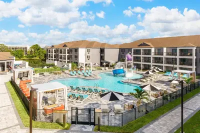 an image of a pool at a resort at Courtyard by Marriott Orlando Lake Buena Vista at Vista Centre in Orlando