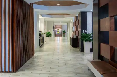 a hallway of a building with a hallwayngth at SpringHill Suites by Marriott Orlando Convention Center in Orlando