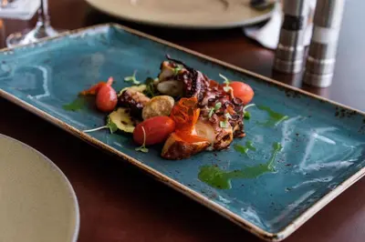 a blue plate of food on a table at Hyatt Regency Orlando International Airport Hotel in Orlando