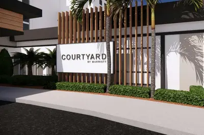 a sign for the courtyard of a building at Courtyard by Marriott across Universal Orlando in Orlando